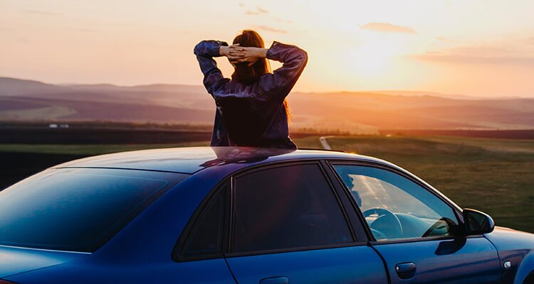 A person enjoying one of the safest cars to drive