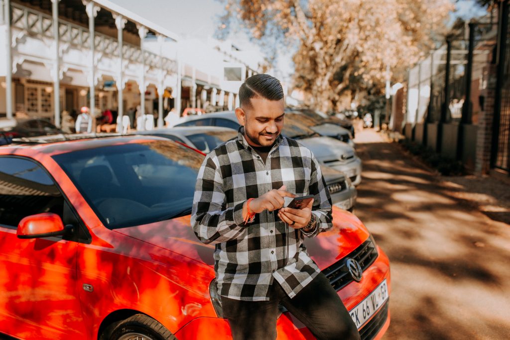 Man buying car insurance online from his phone